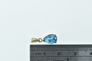 14K Pear Blue Topaz Classic Solitaire Pendant Yellow Gold