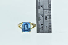 Load image into Gallery viewer, 14K Emerald Cut Blue Topaz Solitaire Statement Ring Yellow Gold