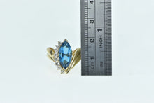 Load image into Gallery viewer, 14K Marquise Blue Topaz Diamond Bypass Ring Yellow Gold