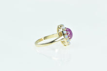 Load image into Gallery viewer, 14K Oval Syn. Star Ruby Opal Halo Statement Ring Yellow Gold