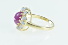 Load image into Gallery viewer, 14K Oval Syn. Star Ruby Opal Halo Statement Ring Yellow Gold
