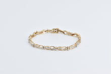 Load image into Gallery viewer, 10K 1.50 Ctw Baguette Diamond Wavy Link Tennis Bracelet 7" Yellow Gold