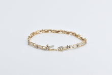 Load image into Gallery viewer, 10K 1.50 Ctw Baguette Diamond Wavy Link Tennis Bracelet 7" Yellow Gold