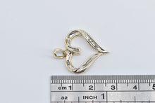 Load image into Gallery viewer, 10K Baguette Diamond Heart Love Symbol Pendant Yellow Gold