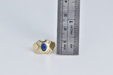 Load image into Gallery viewer, 14K Oval Sim. Sapphire CZ X Criss Cross Fashion Ring Yellow Gold