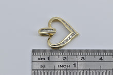 Load image into Gallery viewer, 10K Baguette Diamond Heart Love Symbol Pendant Yellow Gold