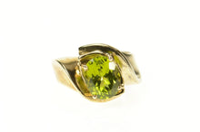 Load image into Gallery viewer, 10K Oval Peridot Classic Simple Bypass Statement Ring Size 6.75 Yellow Gold