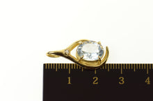 Load image into Gallery viewer, 10K Oval Blue Topaz Diamond Accent Statement Pendant Yellow Gold