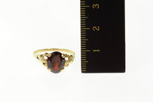 Load image into Gallery viewer, 10K Oval Sim. Garnet Retro Statement Ring Size 8 Yellow Gold
