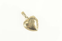 Load image into Gallery viewer, 10K Susan Etched Forget Me Not Puffy Heart Locket Charm/Pendant Yellow Gold