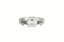 Load image into Gallery viewer, Sterling Silver Asscher Syn. Sapphire Ornate Travel Engagement Ring