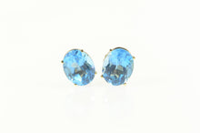 Load image into Gallery viewer, 14K Oval Blue Topaz Solitaire Classic Stud Earrings Yellow Gold