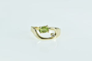14K Oval Peridot Diamond Accent Curved Loop Ring Yellow Gold
