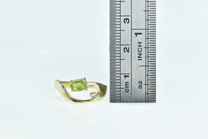14K Oval Peridot Diamond Accent Curved Loop Ring Yellow Gold