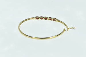 10K Oval Garnet Diamond Accent Bangle Bracelet 6.5" Yellow Gold