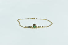 Load image into Gallery viewer, 9K Heart Claddagh Celtic Syn. Emerald CZ Chain Bracelet 7.25&quot; Yellow Gold