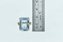 Load image into Gallery viewer, 14K Emerald Cut Blue Topaz Solitaire Cocktail Ring Yellow Gold