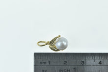 Load image into Gallery viewer, 14K 7.7mm Pearl Leaf Accent Nature Motif Pendant Yellow Gold