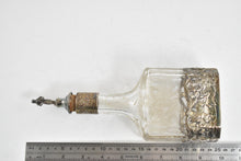 Load image into Gallery viewer, Sterling Silver Ornate Dutch Motif Floral Glass Decanter