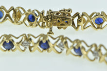 Load image into Gallery viewer, 10K Vintage Syn. Sapphire Diamond X Link Tennis Bracelet 7&quot; Yellow Gold