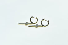 Load image into Gallery viewer, 10K Diamond Encrusted Cross Dangle Huggies Hoop Earrings Yellow Gold