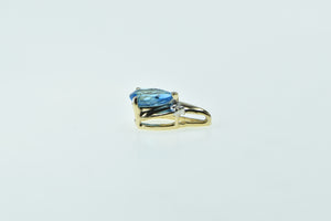 10K Pear Blue Topaz Diamond Accent Fashion Pendant Yellow Gold