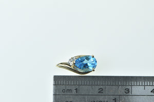 10K Pear Blue Topaz Diamond Accent Fashion Pendant Yellow Gold