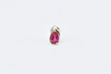 Load image into Gallery viewer, 10K Oval Syn. Ruby Diamond Accent Single Stud Earring Yellow Gold