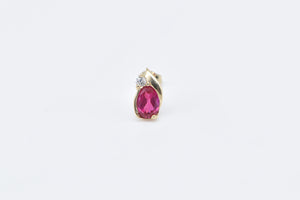 10K Oval Syn. Ruby Diamond Accent Single Stud Earring Yellow Gold