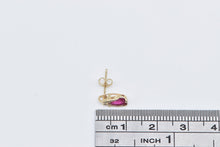 Load image into Gallery viewer, 10K Oval Syn. Ruby Diamond Accent Single Stud Earring Yellow Gold