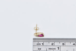 10K Oval Syn. Ruby Diamond Accent Single Stud Earring Yellow Gold