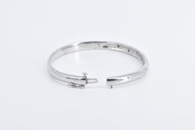 Load image into Gallery viewer, Sterling Silver Diamond Flush Inset Oval Bangle Bracelet 7&quot;