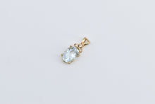 Load image into Gallery viewer, 10K Oval Blue Topaz Diamond Cluster Fashion Pendant Yellow Gold