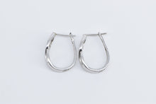 Load image into Gallery viewer, 14K Baguette Diamond Twist Oval Fashion Hoop Earrings White Gold