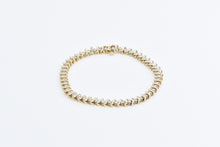 Load image into Gallery viewer, 10K 1.50 Ctw Diamond Classic Wavy Link Tennis Bracelet 6.75&quot; Yellow Gold