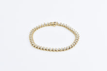 Load image into Gallery viewer, 10K 1.50 Ctw Diamond Classic Wavy Link Tennis Bracelet 6.75&quot; Yellow Gold