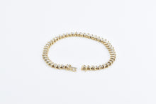 Load image into Gallery viewer, 10K 1.50 Ctw Diamond Classic Wavy Link Tennis Bracelet 6.75&quot; Yellow Gold