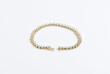 Load image into Gallery viewer, 10K 1.50 Ctw Diamond Classic Wavy Link Tennis Bracelet 6.75&quot; Yellow Gold