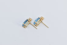 Load image into Gallery viewer, 14K Pear Blue Topaz Diamond Accent Stud Earrings Yellow Gold