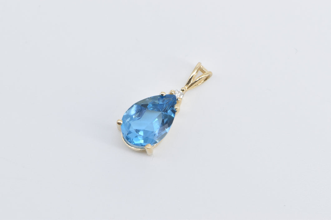 14K Pear Blue Topaz Diamond Accent Fashion Pendant Yellow Gold