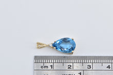 Load image into Gallery viewer, 14K Pear Blue Topaz Diamond Accent Fashion Pendant Yellow Gold