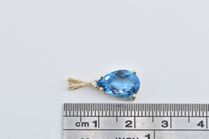 14K Pear Blue Topaz Diamond Accent Fashion Pendant Yellow Gold