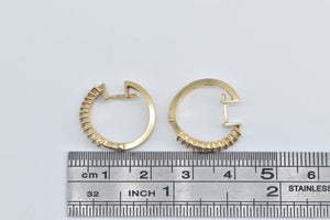 14K 0.22 Ctw Diamond Wavy 17.4mm Huggies Hoop Earrings Yellow Gold