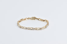 Load image into Gallery viewer, 10K 1.50 Ctw Baguette Diamond Wavy Link Tennis Bracelet 7&quot; Yellow Gold