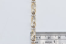 Load image into Gallery viewer, 10K 1.50 Ctw Baguette Diamond Wavy Link Tennis Bracelet 7&quot; Yellow Gold