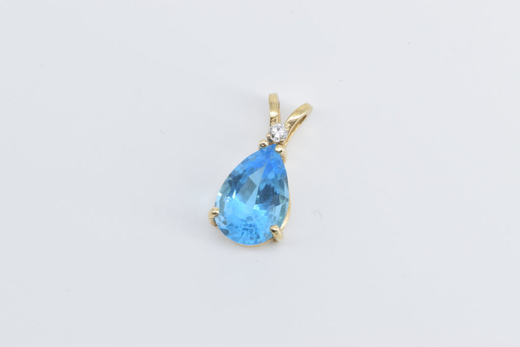 14K Pear Blue Topaz Diamond Accent Statement Pendant Yellow Gold