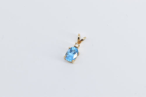 14K Oval Blue Topaz Diamond Accent Vintage Pendant Yellow Gold