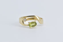 Load image into Gallery viewer, 14K Oval Peridot Diamond Accent Wavy Curve Ring Yellow Gold