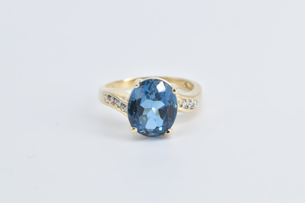 14K Oval Blue Topaz Diamond Bypass Cocktail Ring Yellow Gold