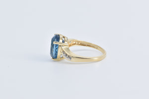 14K Oval Blue Topaz Diamond Bypass Cocktail Ring Yellow Gold